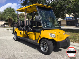 Yellow Tomberlin 6 Passenger Golf Cart delray golf cart rental, golf cart rentals, rent golf cars